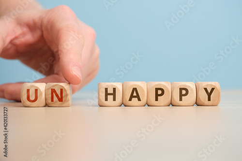 The concept of happy and unhappy as an antonym and change.