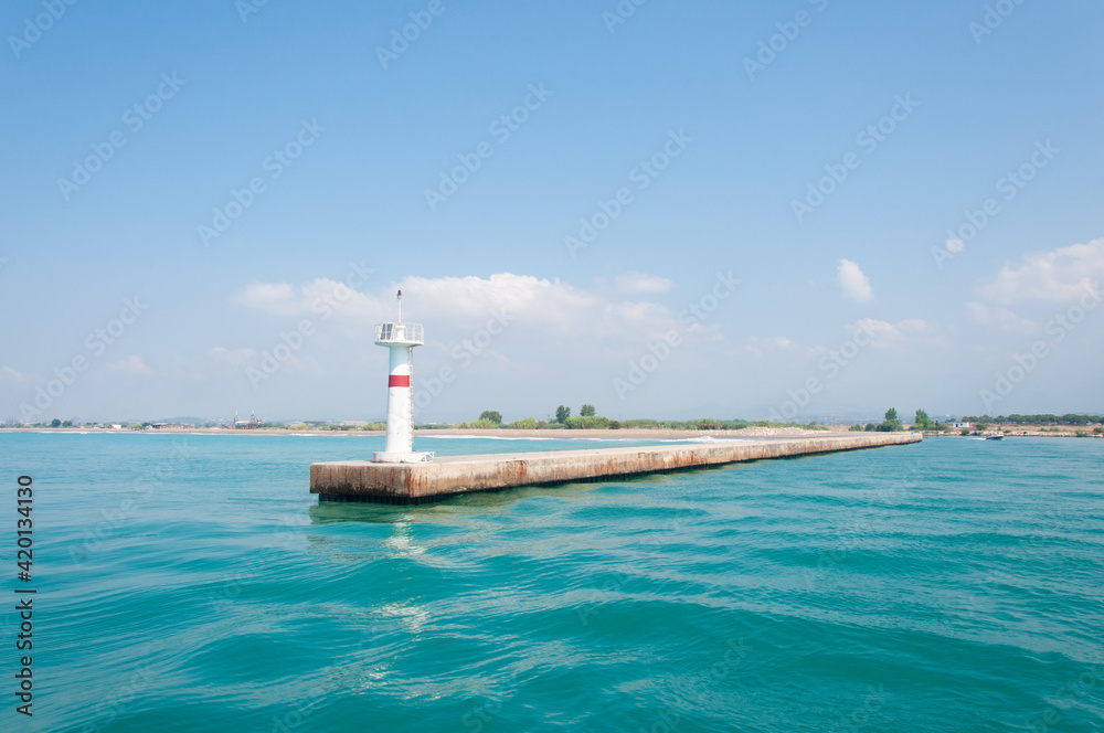 Lighthouse in blue sea. beautiful mediterranean landscape