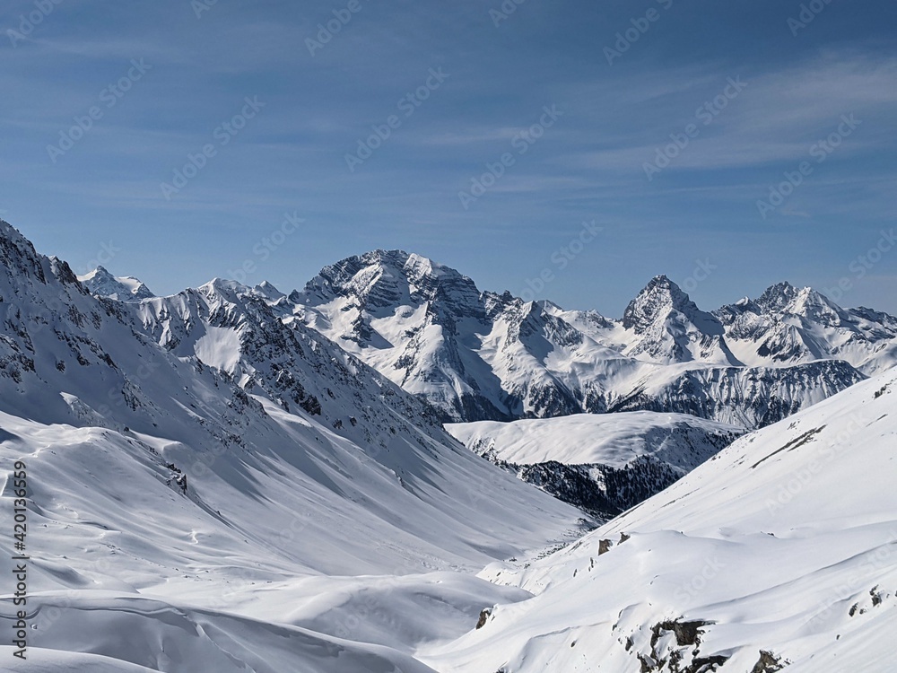 beautiful snowy mountain peaks. Winter panorama in the canton of grisons, davos, Sertig. Ducan peaks and glaciers, skimo