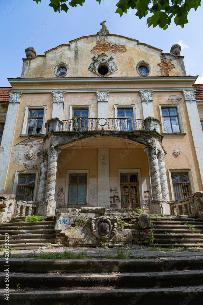 Old  palace of Archbishops in park. Obroshino village near Lviv city. Ukraine.
