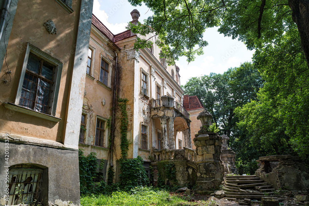 Old  palace of Archbishops in park. Obroshino village near Lviv city. Ukraine.