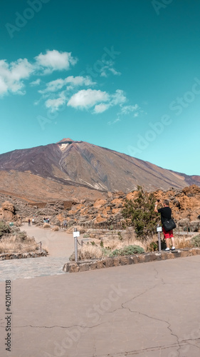 Tourist taking a picture of a Teide volcano in Gran Canaria, Spain. 