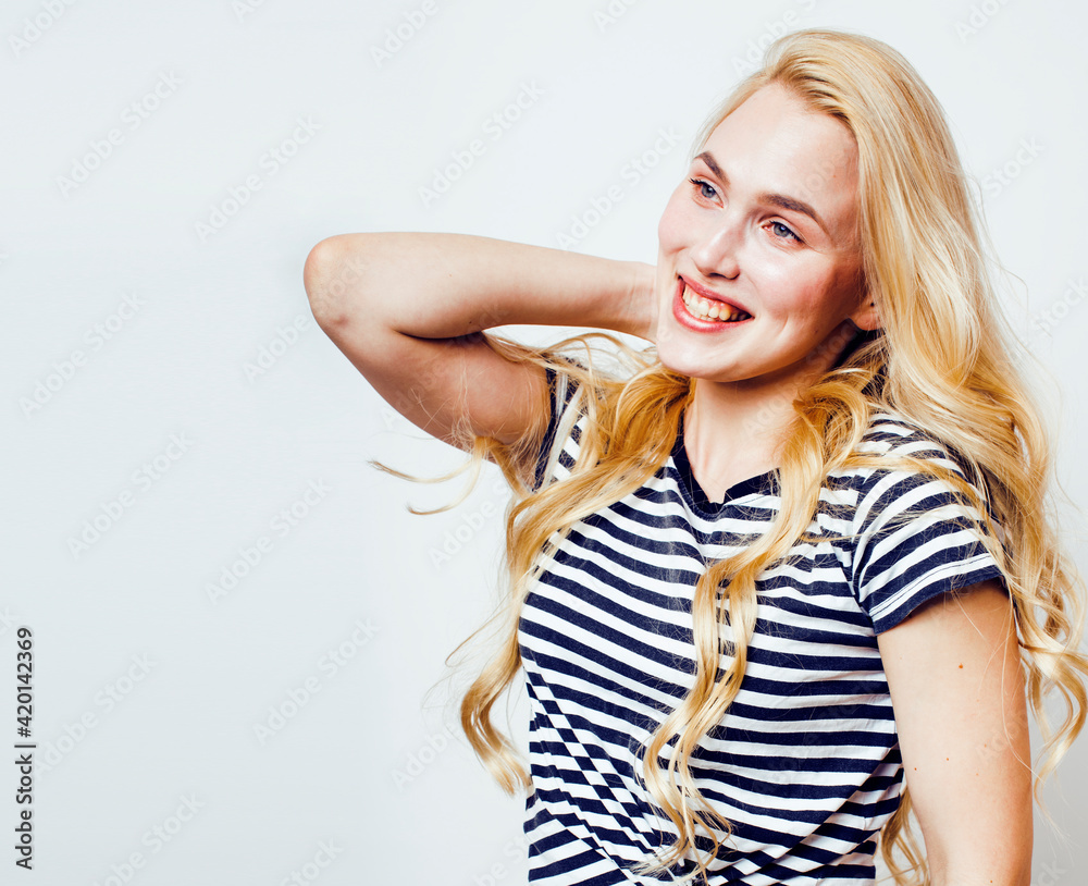 young pretty teenage hipster girl posing emotional happy smiling on white background, lifestyle people concept young pretty teenage hipster girl posing emotional happy smiling on white background, lifestyle people concept