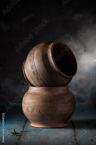 Clay pots on a blue rustic table