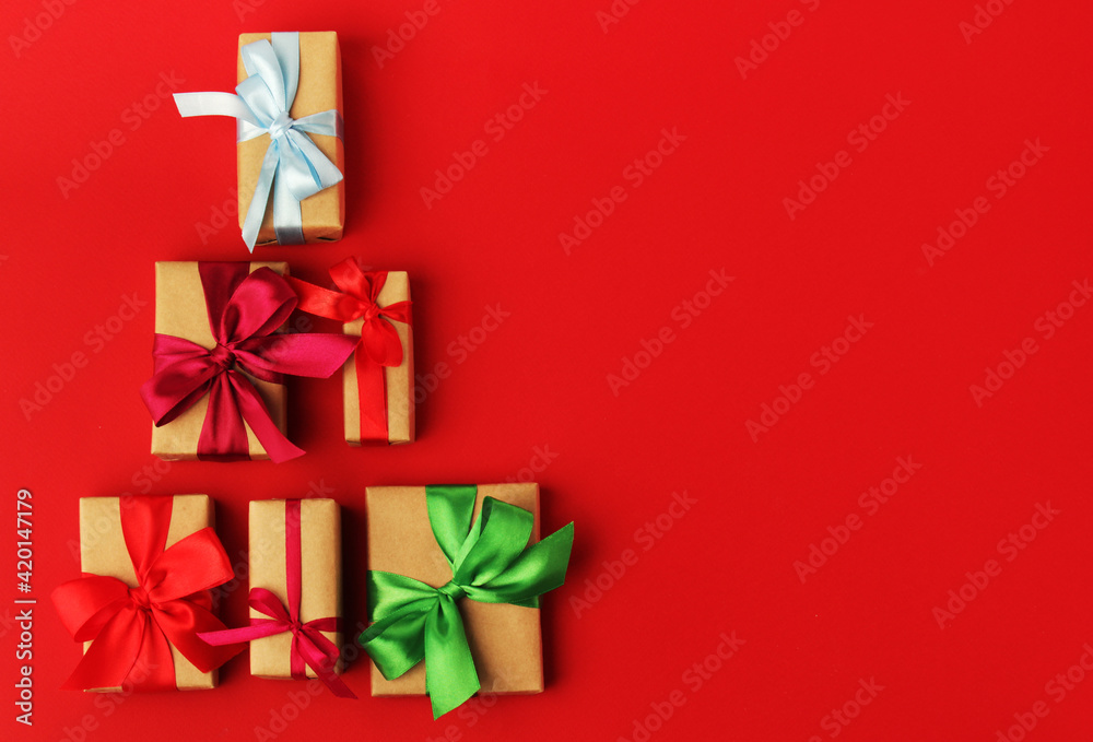 Gifts packed with craft paper and colorful satin ribbons Gifts packed with craft paper and colorful satin ribbons