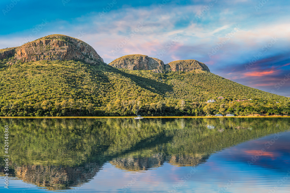 Fototapeta premium magaliesberg mountains view from hartbeespoort dam with blue sky