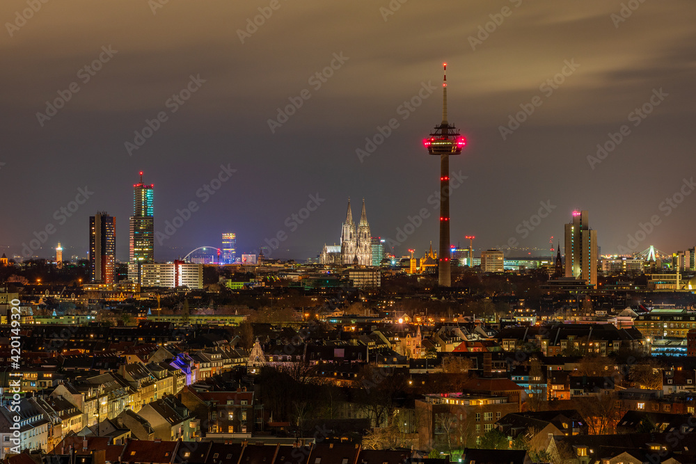 Cologne cityscape at night, Germany..View of Cologne Cathedral and Colonius TV Tower.