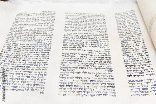 writing torah scroll  sefer torah a torah mitzvah silver crowns ornaments jewish hebrew photo