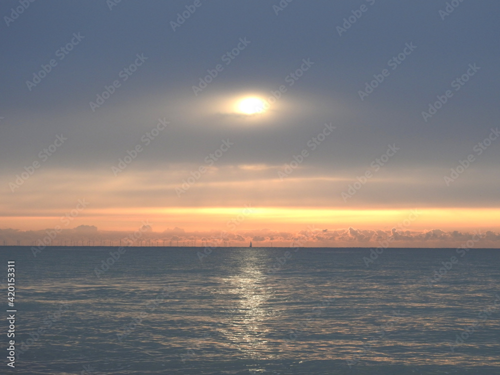 Horizontal sunrise over the sea