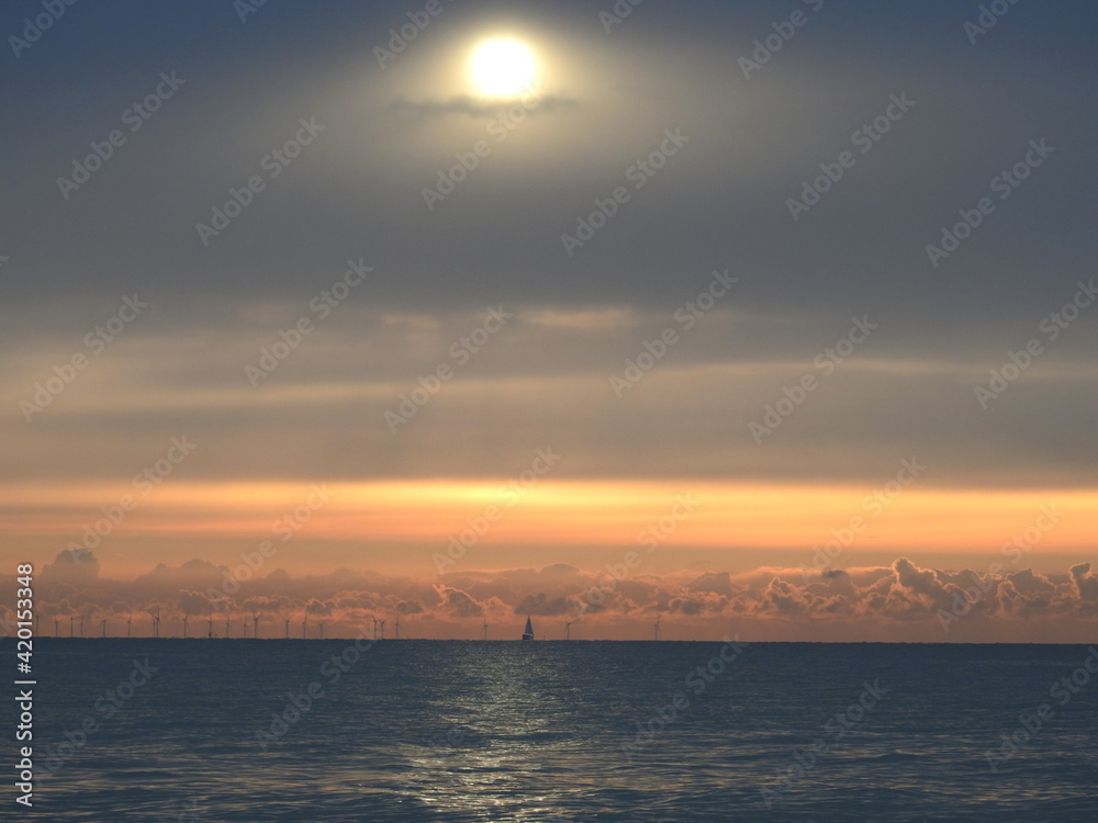 Horizontal sunrise over the sea