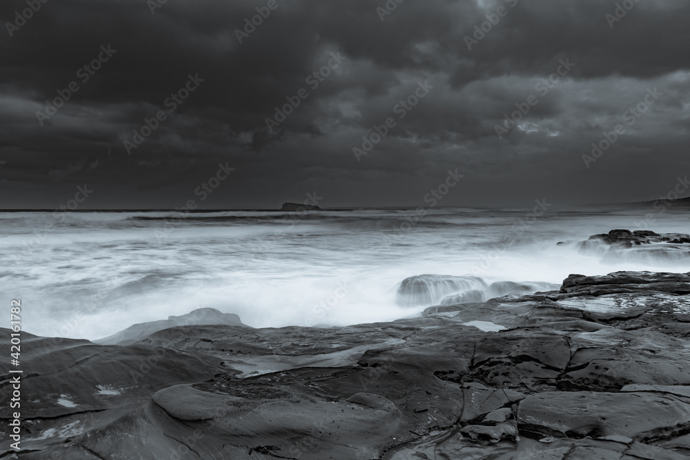 Rainy day moody seascape in monochrome Rainy day moody seascape in monochrome