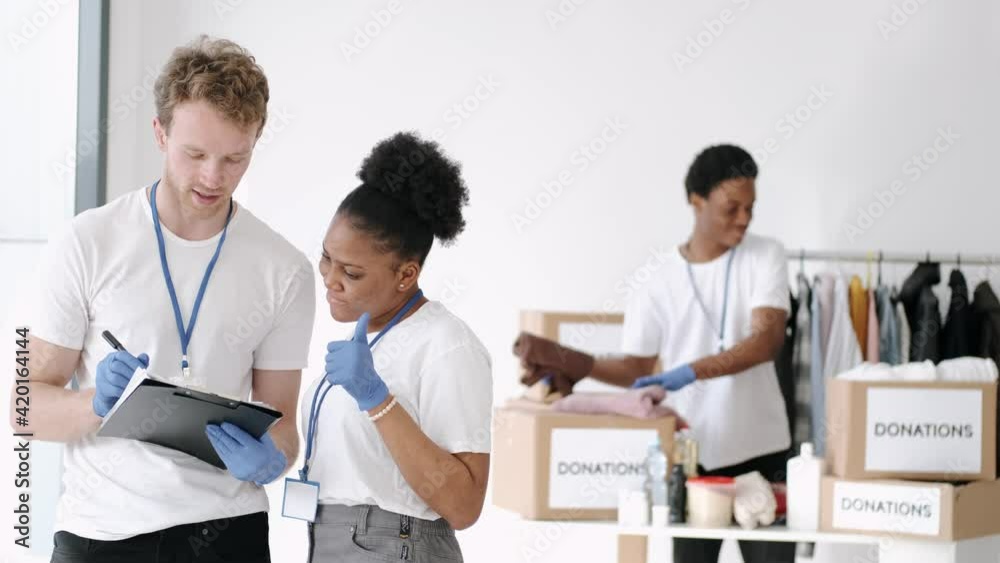 working in a volunteering place and a group to help people who are in need working in a volunteering place and a group to help people who are in need