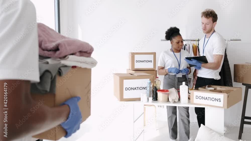 working in a volunteering place and a group to help people who are in need working in a volunteering place and a group to help people who are in need
