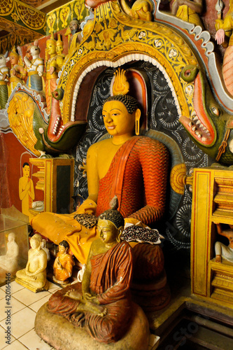 Buddha images at Embekka Devale (Embekke Devala), Kandy, Sri Lanka photo