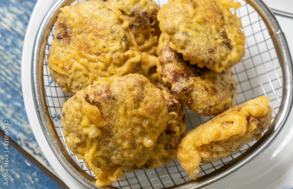 Freshly fried mung bean fritters or locally known as Freshly fried mung bean fritters or locally known as