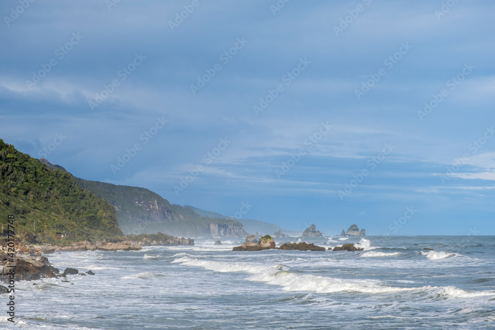 Ocean surf on a remote beach. South Island, New Zealand. Ocean surf on a remote beach. South Island, New Zealand.