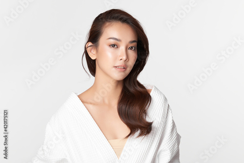 Fotografie Beautiful young asian woman with clean fresh skin on white background, Face care