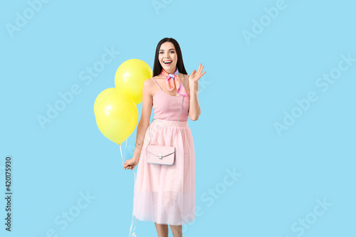 Beautiful young woman with ...