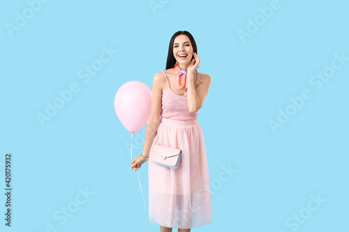 Beautiful young woman with ...