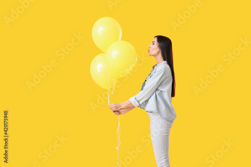 Beautiful young woman with ...