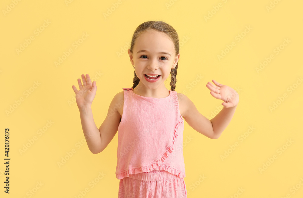 Cute little girl on color background Cute little girl on color background