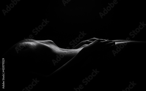 Naked Woman Sexy Silhouette, Sensual Girl Pose, Nude Body Dark Black and White © Roman Kornev