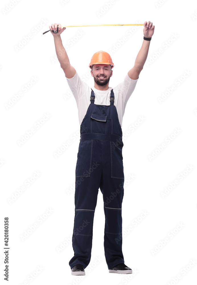 in full growth. man Builder with construction tape measure