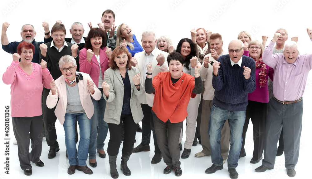 Obraz premium Group of senior people raising their hands celebrating a victory