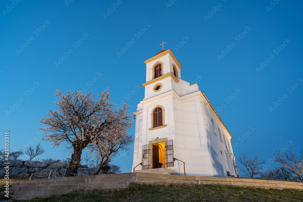 Small chapel with almond tree Small chapel with almond tree