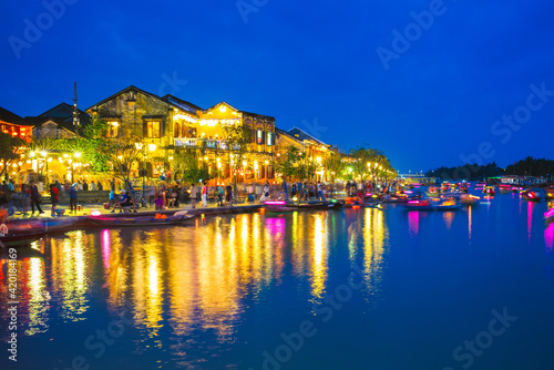 Hoi An ancient town by Thu Bon River in Vietnam at night