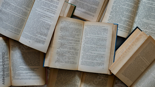 Many old books as a background image.