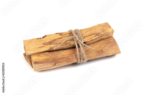 Palo Santo tree sticks isolated on white - holy incense tree from Latin America. Meditation, mental health and personal fulfilment concept. Selective focus