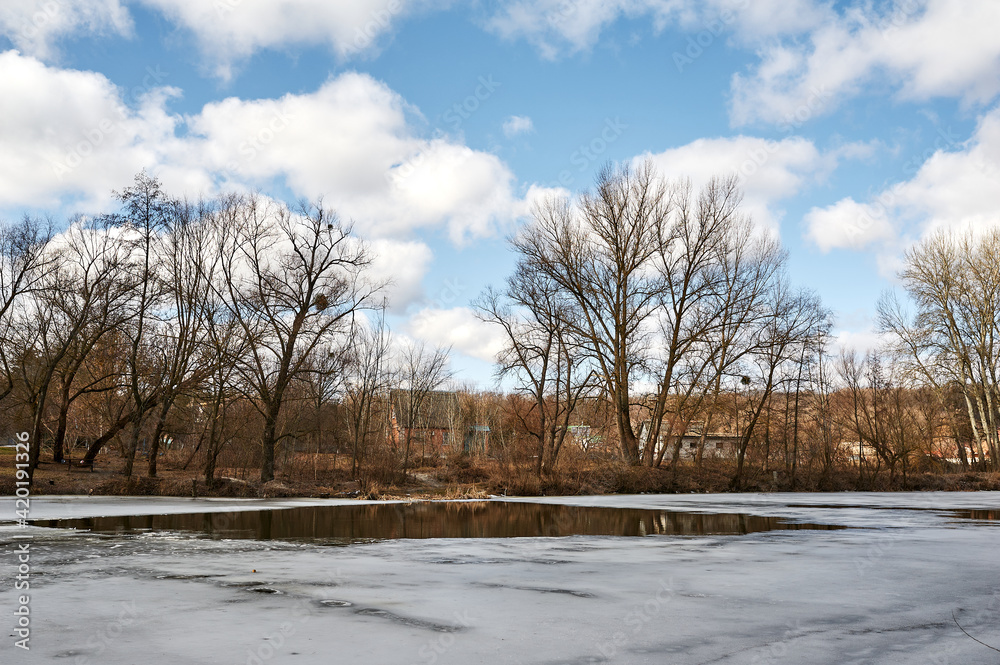 Thin ice on the river in early spring Thin ice on the river in early spring