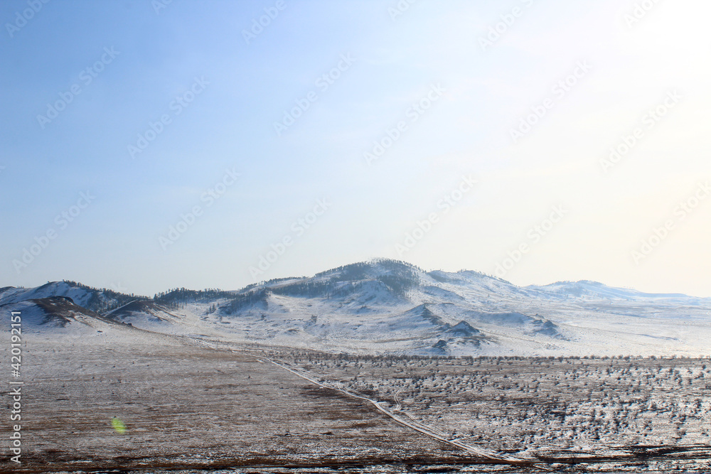 Scenic Snowcapped Mountains View and Snow Valley in Siberia 