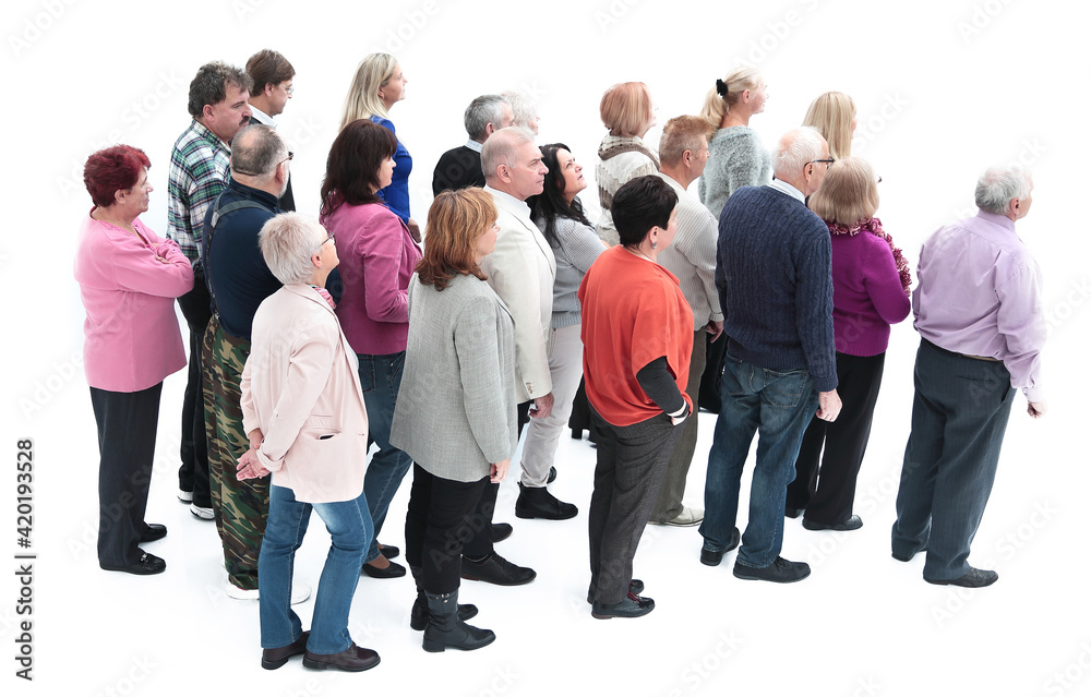 Obraz premium group of diverse elderly people standing in front of a closed door