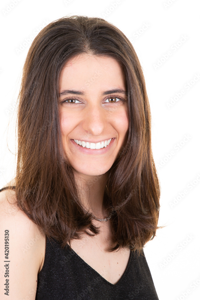 cute pretty smiling brown hairs woman looks in camera over white wall background cute pretty smiling brown hairs woman looks in camera over white wall background
