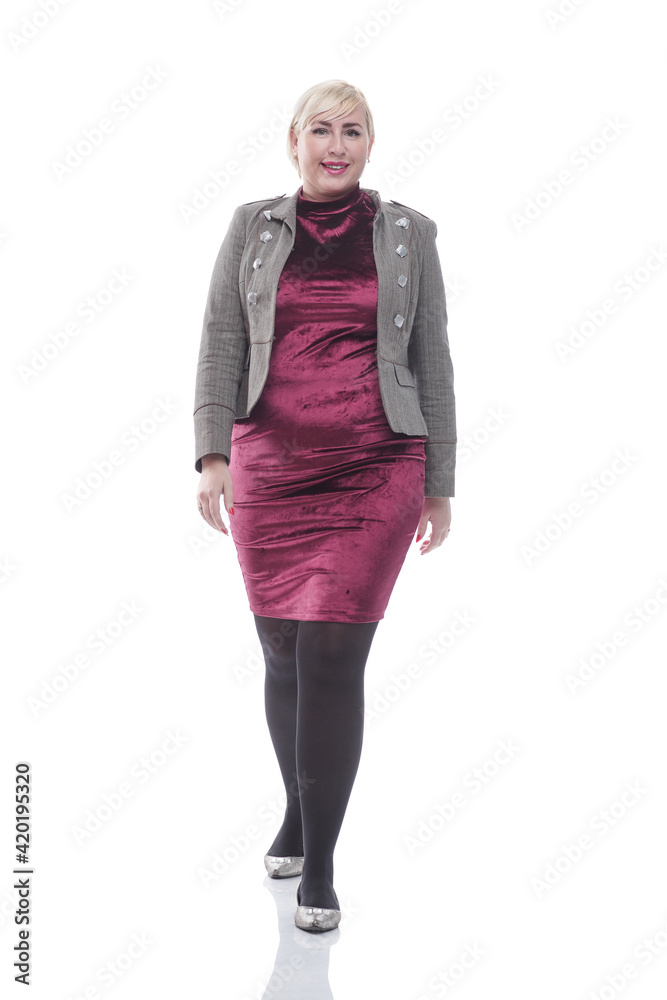 full- length . attractive young woman striding forward full- length . attractive young woman striding forward