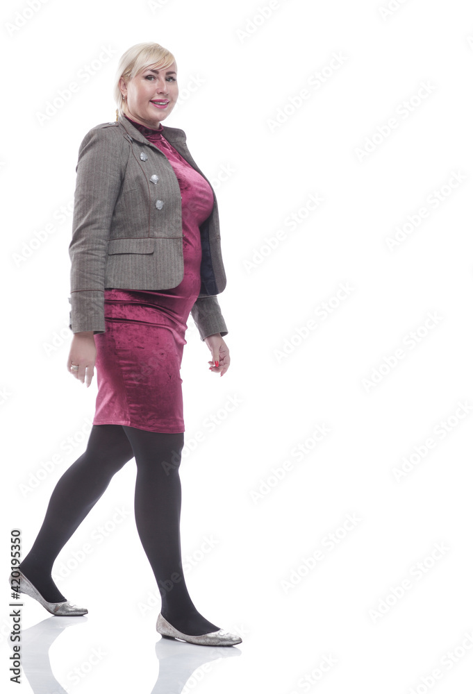casual young woman stepping forward . isolated on a white casual young woman stepping forward . isolated on a white