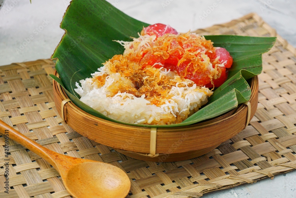 Blurry Ketan Lupis Cenil, Indonesian traditional market snack on banana
