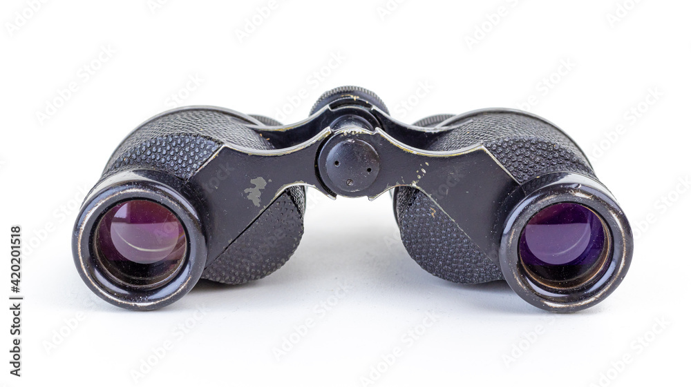 Old military binoculars close-up. Soft focus. Old military binoculars close-up. Soft focus.