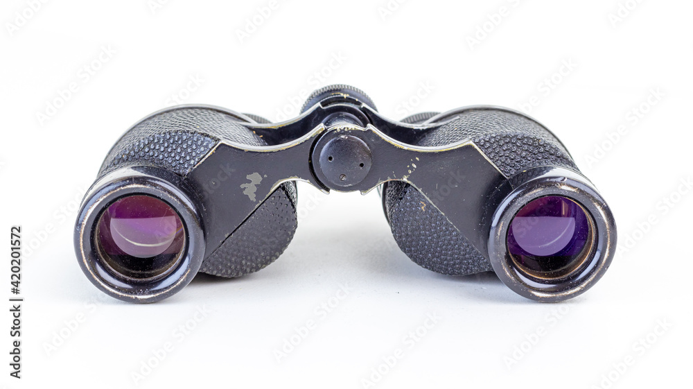 Old military binoculars close-up. Soft focus. Old military binoculars close-up. Soft focus.