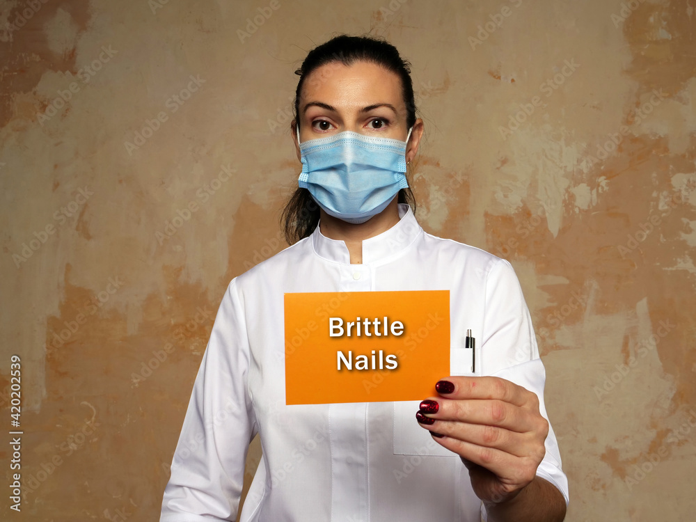 Fotografie Healthcare concept meaning Brittle Nails with phrase on the page.