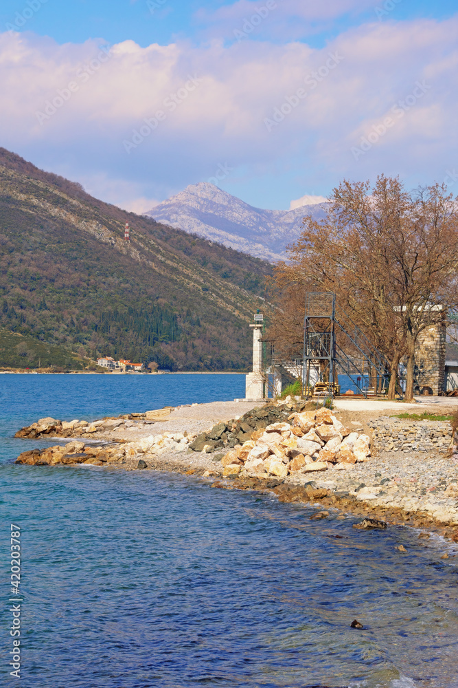 Beautiful Mediterranean landscape on sunny winter day. Montenegro, Adriatic Sea. Coast of Kotor Bay near Verige Strait