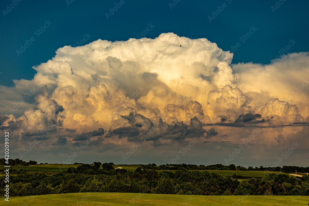 High detail thunderstorm clouds over a rural landscape High detail thunderstorm clouds over a rural landscape