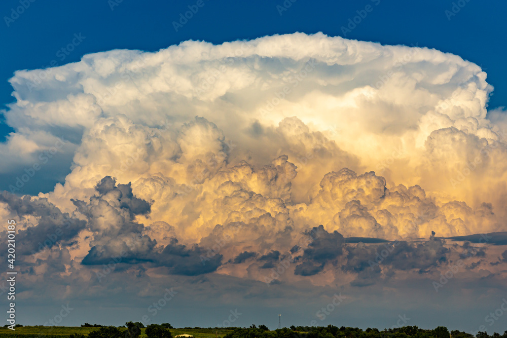 High detail thunderstorm clouds over a rural landscape 