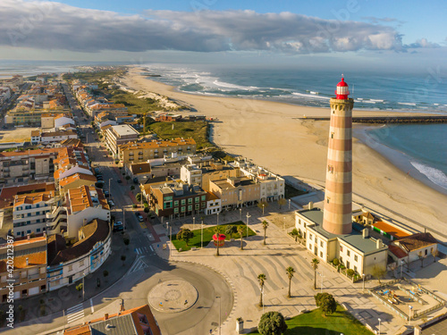 Fotografie Lighthouse into the Barra beach in Aveiro, Portugal