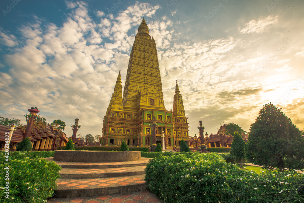 Obraz premium The beautiful sculpture background of, Wat Bang Thong, surrounded by trees, has a large area, is a religious tourist attraction in Krabi, with tourists always visiting, Thailand