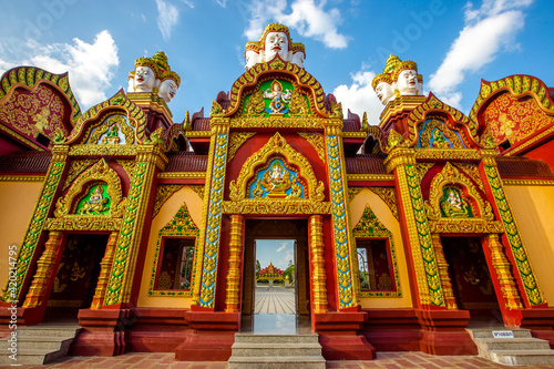 The beautiful sculpture background of, Wat Bang Thong, surrounded by trees, has a large area, is a religious tourist attraction in Krabi, with tourists always visiting, Thailand