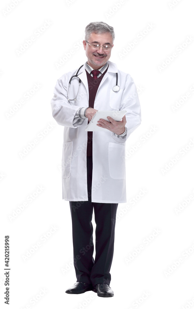 smiling doctor with a digital tablet . isolated on a white smiling doctor with a digital tablet . isolated on a white