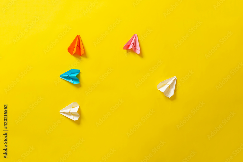 creative idea of the paper planes with tracks, view from above, simple travel concept creative idea of the paper planes with tracks, view from above, simple travel concept
